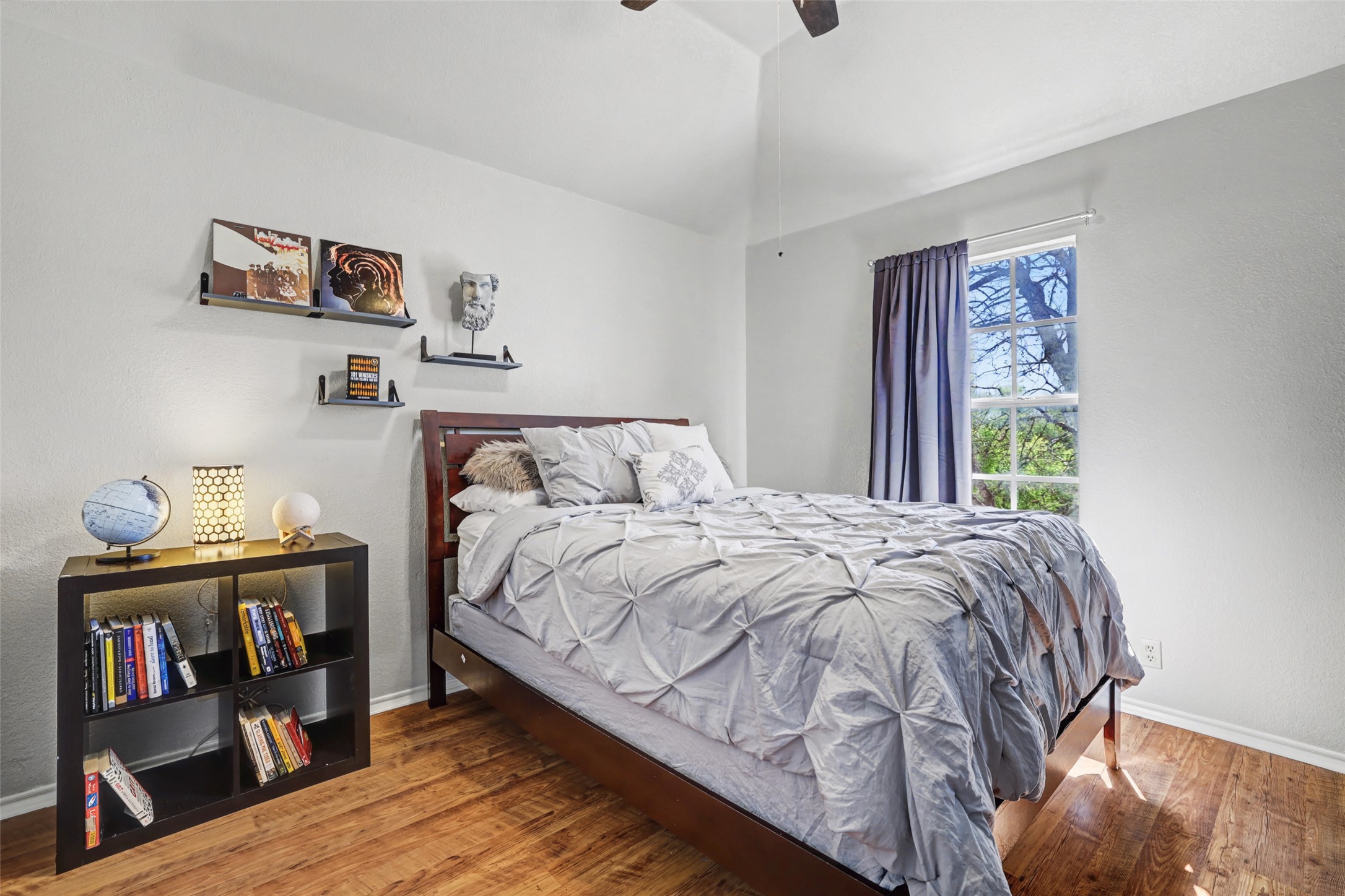 1109 Pebble Brook Road Cedar Park, TX 78613 - Photo 29 of 40 Bedroom featuring light wood-style floors, lofted ceiling, and a ceiling fan