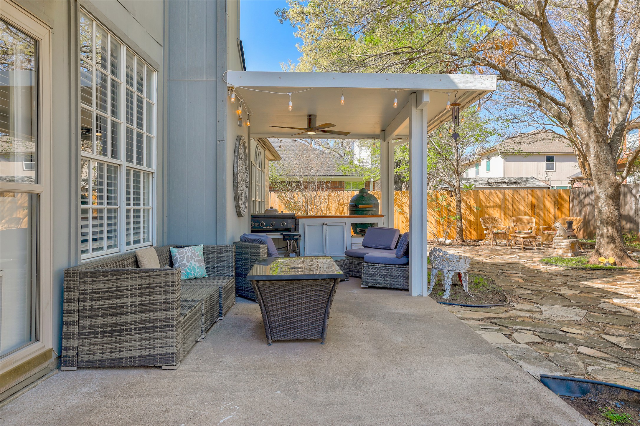 1109 Pebble Brook Road Cedar Park, TX 78613 - Photo 34 of 40 Fenced backyard with ceiling fan, a patio, and an outdoor kitchen with living area