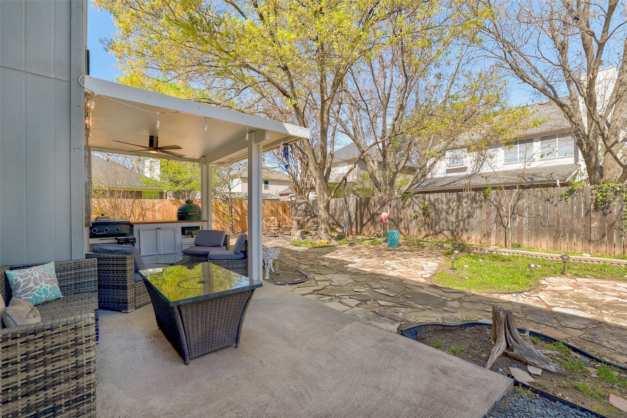 1109 Pebble Brook Road Cedar Park, TX 78613 - Photo 36 of 40 Fenced backyard featuring a patio, a ceiling fan, and an outdoor kitchen and area to lounge