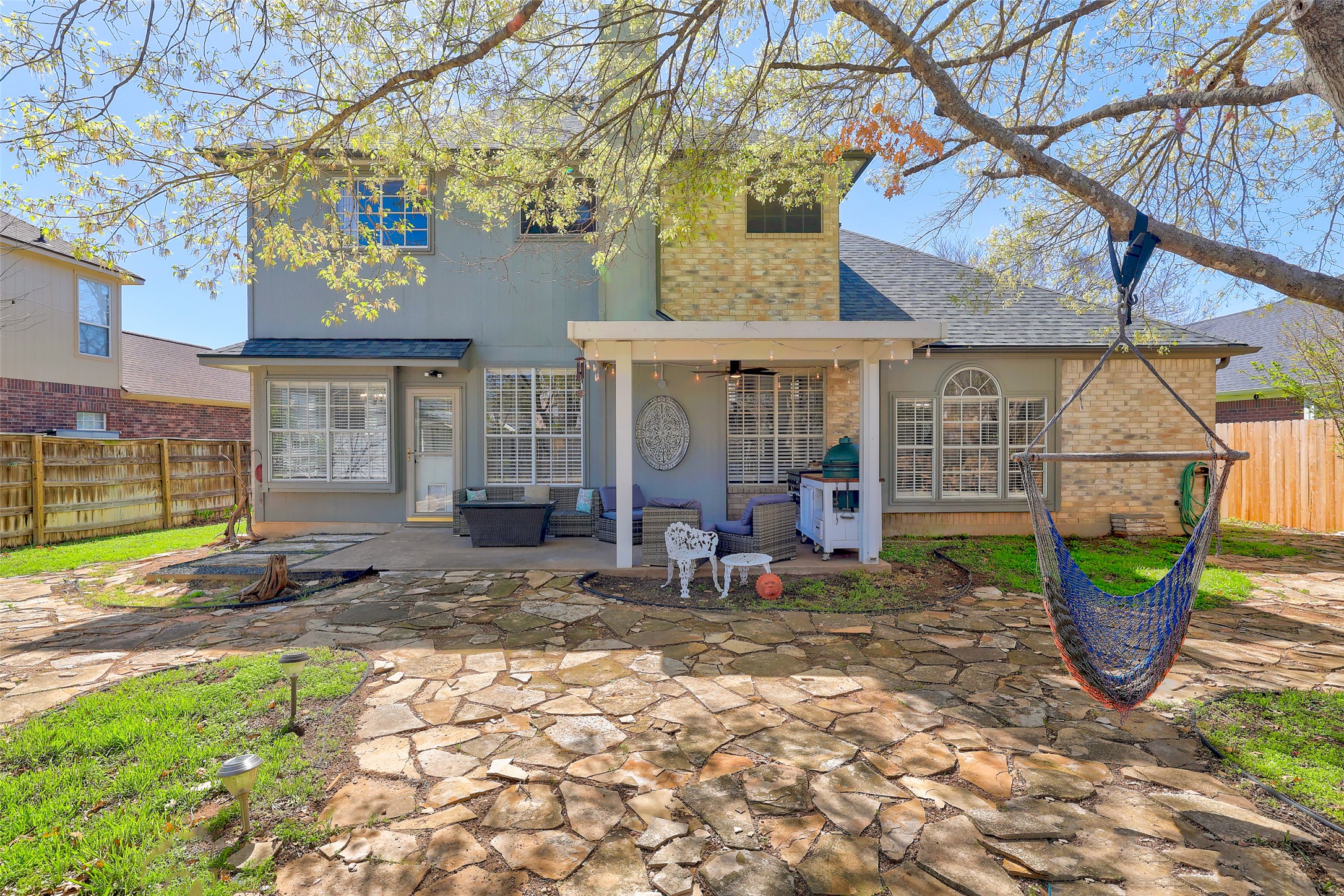 1109 Pebble Brook Road Cedar Park, TX 78613 - Photo 39 of 40 Rear view of property featuring a patio, brick siding, ceiling fan, outdoor lounge area, and a shingled roof
