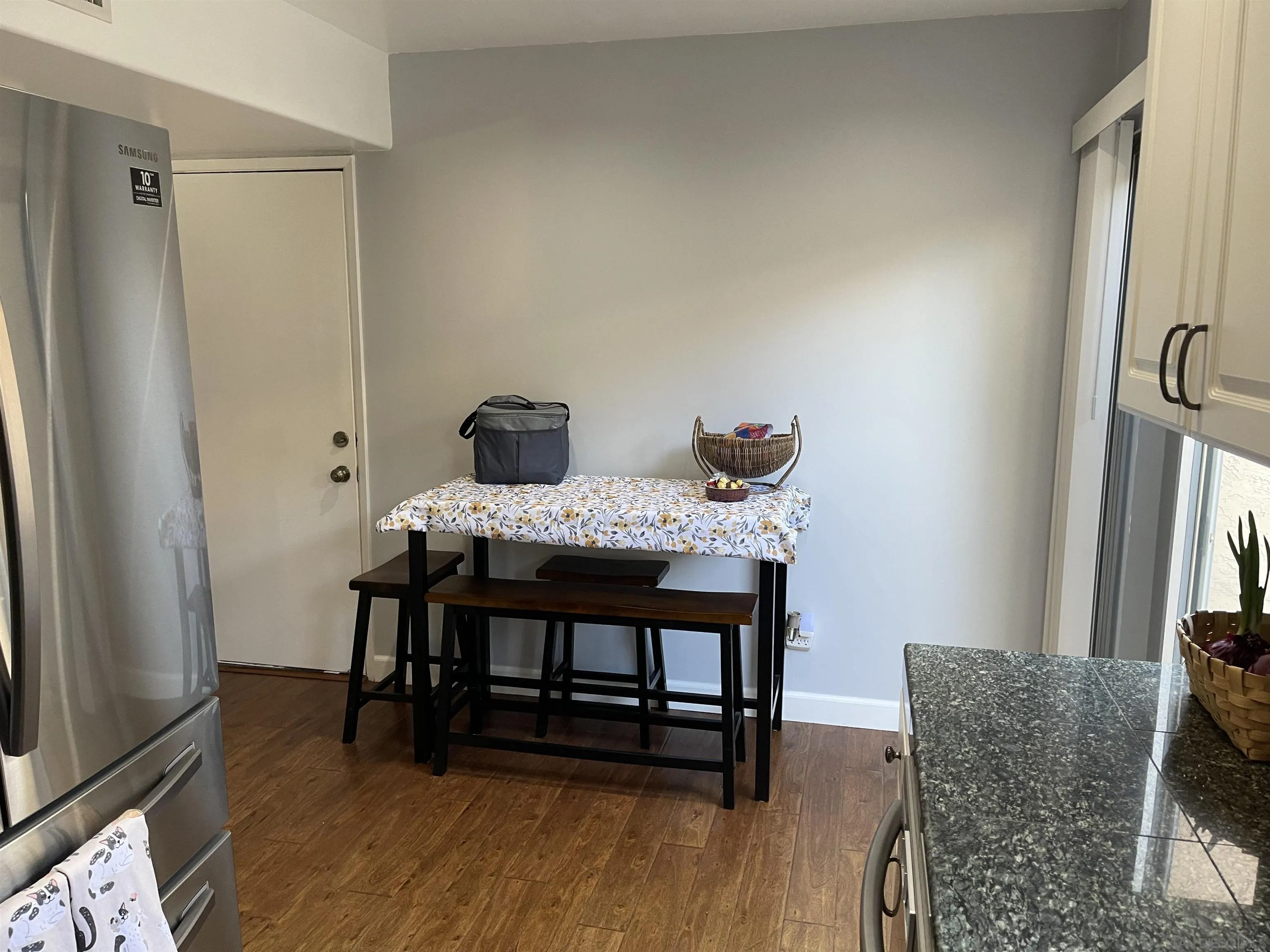 10306 Leila Lane Santee, CA 92071 - Photo 15 of 31 a dining room with furniture and wooden floor