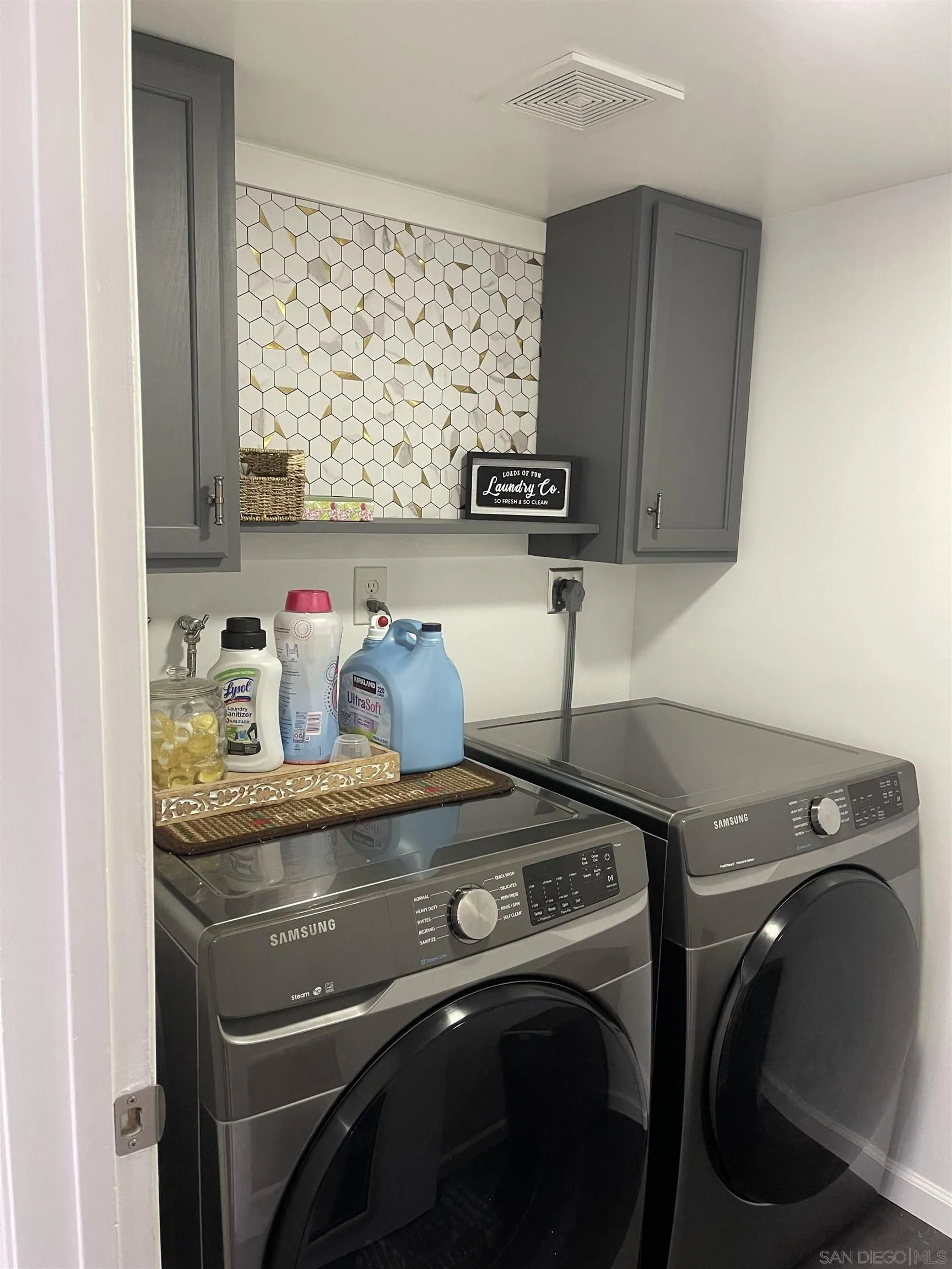 10306 Leila Lane Santee, CA 92071 - Photo 19 of 31 a utility room with dryer and washer