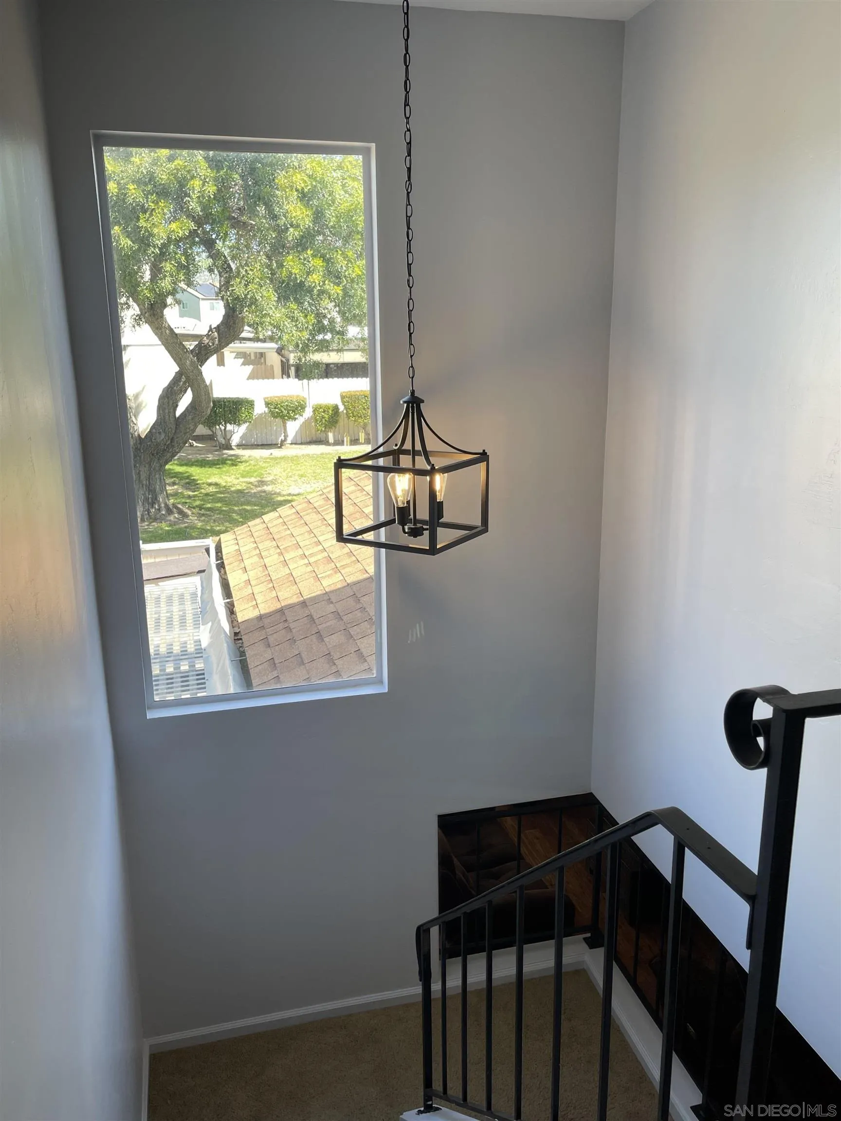 10306 Leila Lane Santee, CA 92071 - Photo 20 of 31 a table and chair in a room