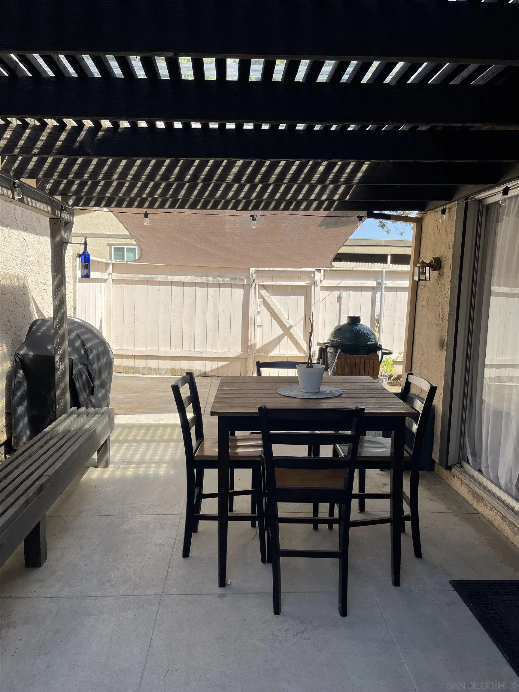 10306 Leila Lane Santee, CA 92071 - Photo 30 of 31 a view of a dinning table and chairs in patio
