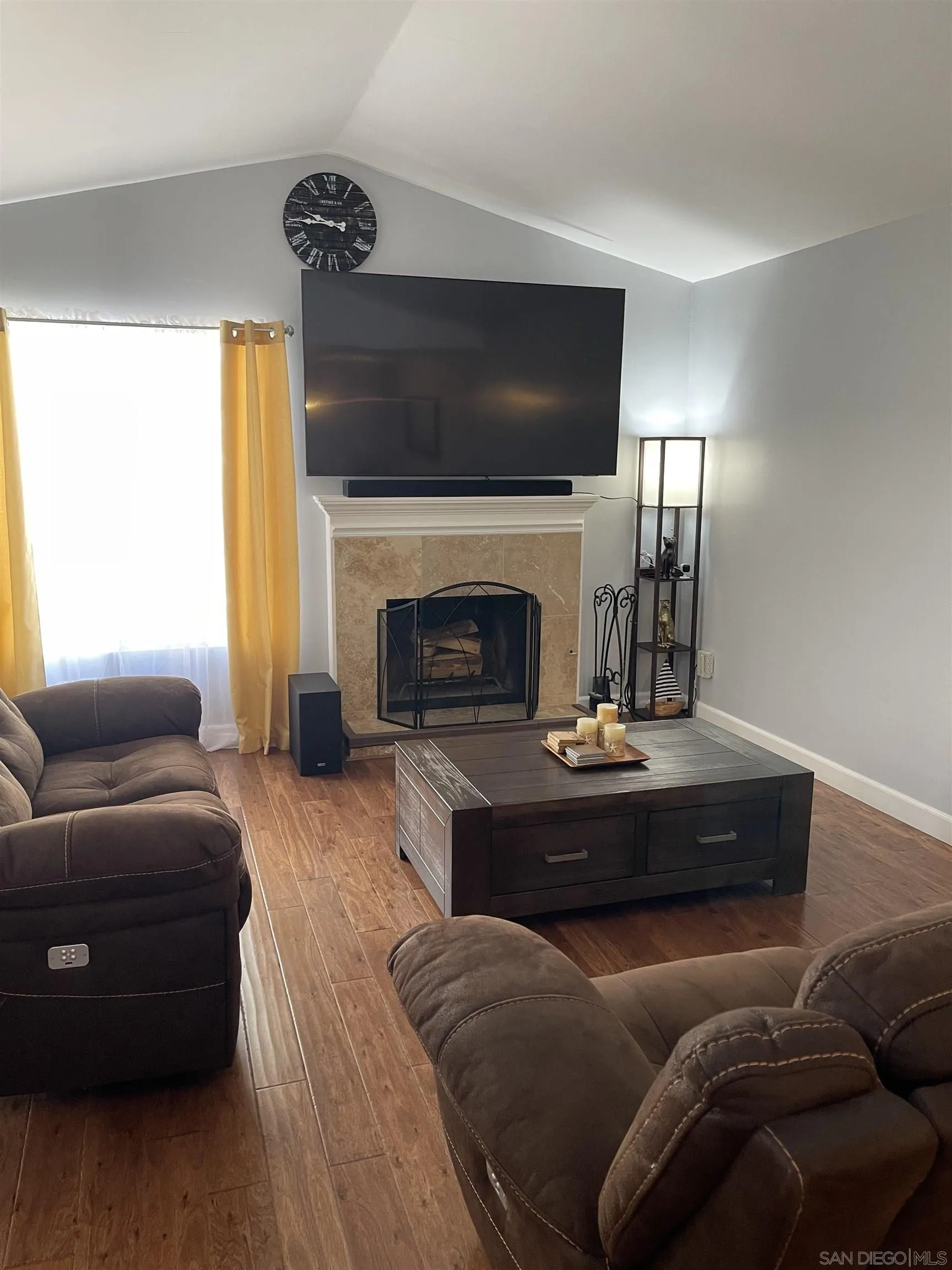 10306 Leila Lane Santee, CA 92071 - Photo 6 of 31 a living room with furniture and a fireplace