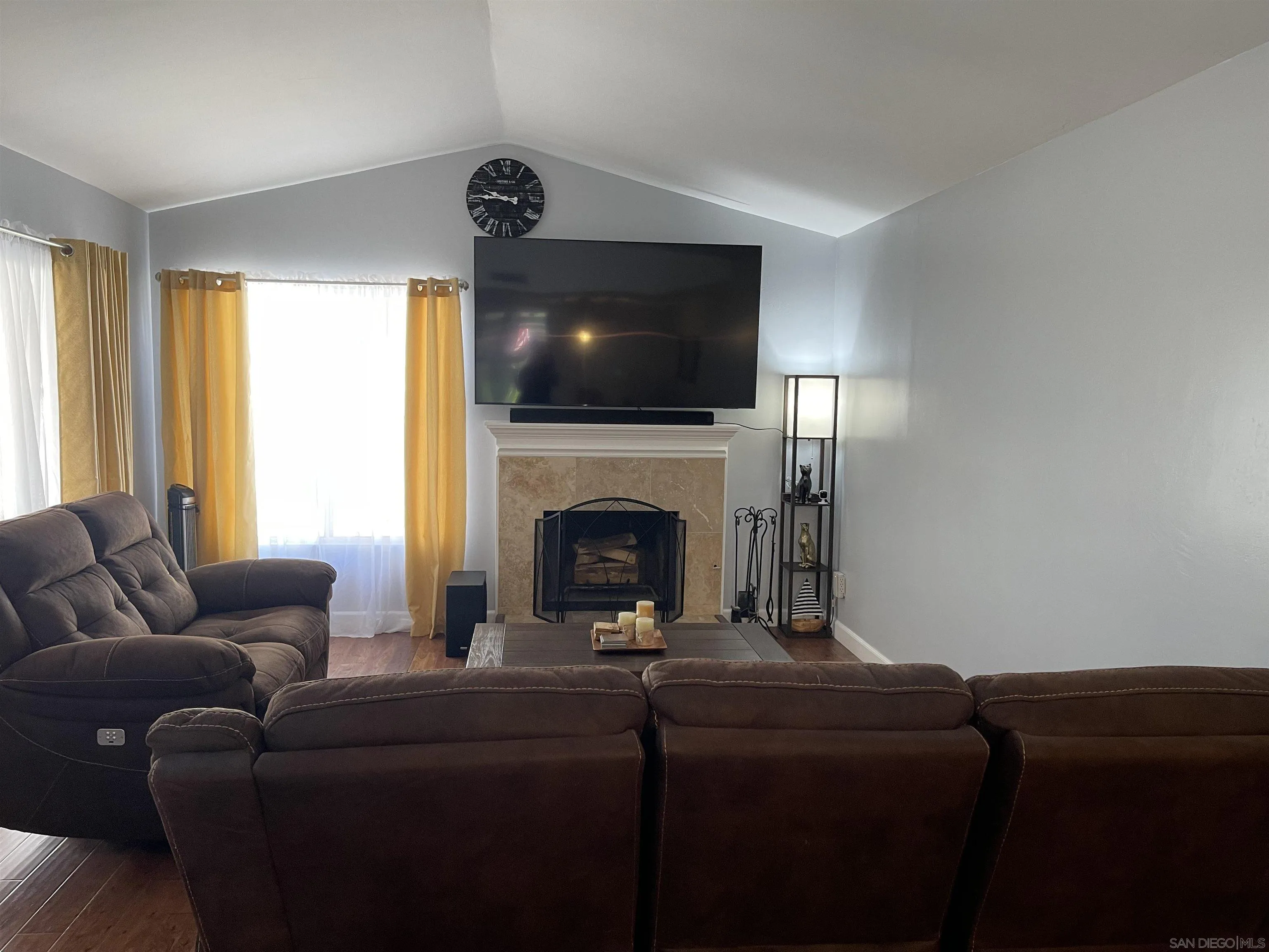 10306 Leila Lane Santee, CA 92071 - Photo 10 of 31 a living room with furniture and a flat screen tv