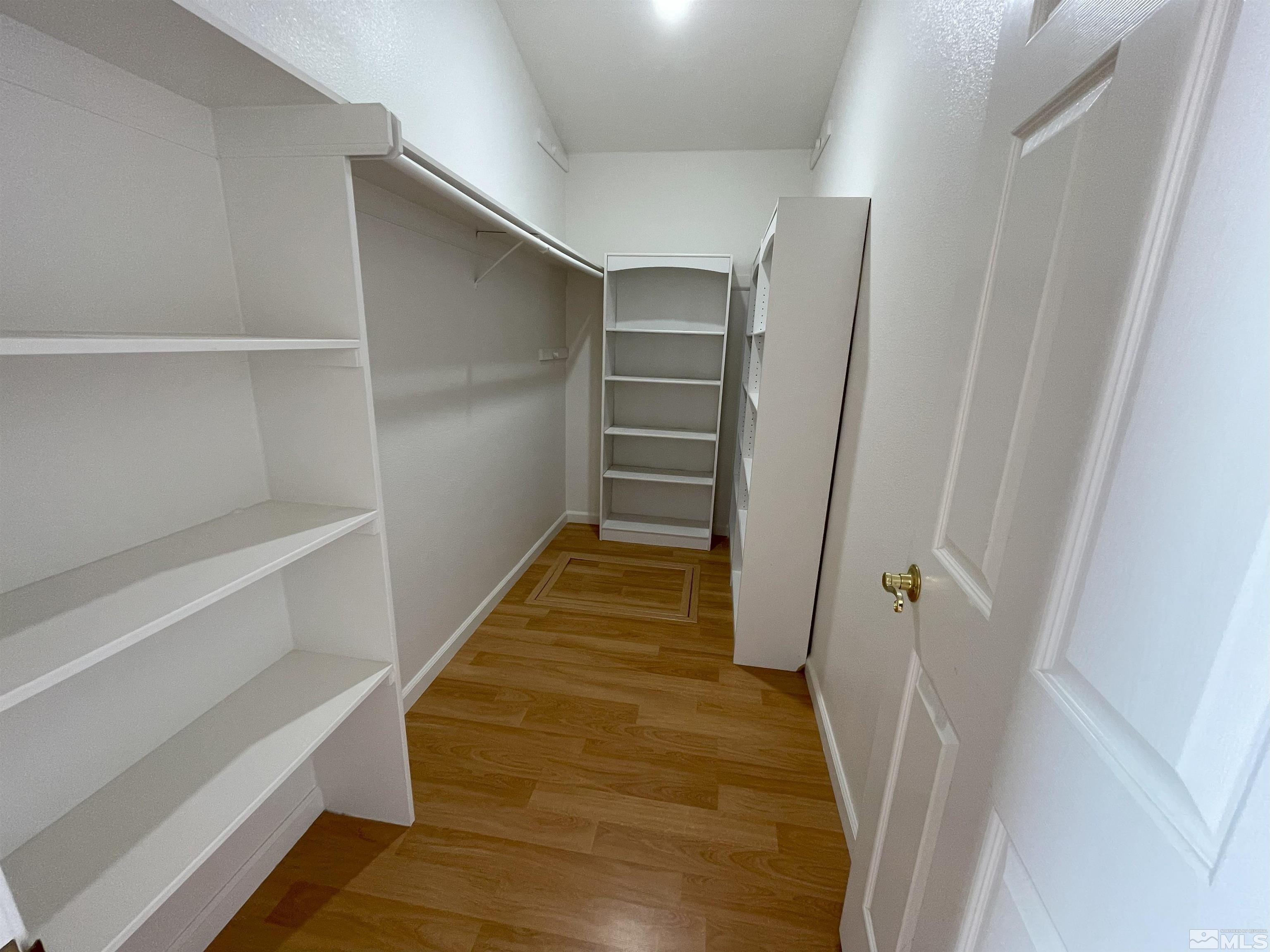 15064 North Red Rock Road Reno, NV 89508 - Photo 9 of 40 a hallway view with staircase