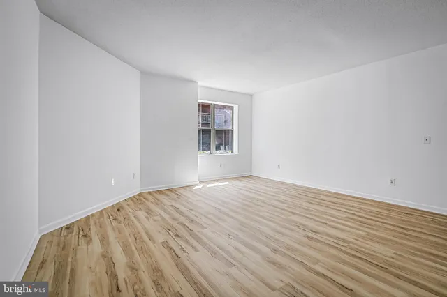 a en suite bathroom with a sink and mirror