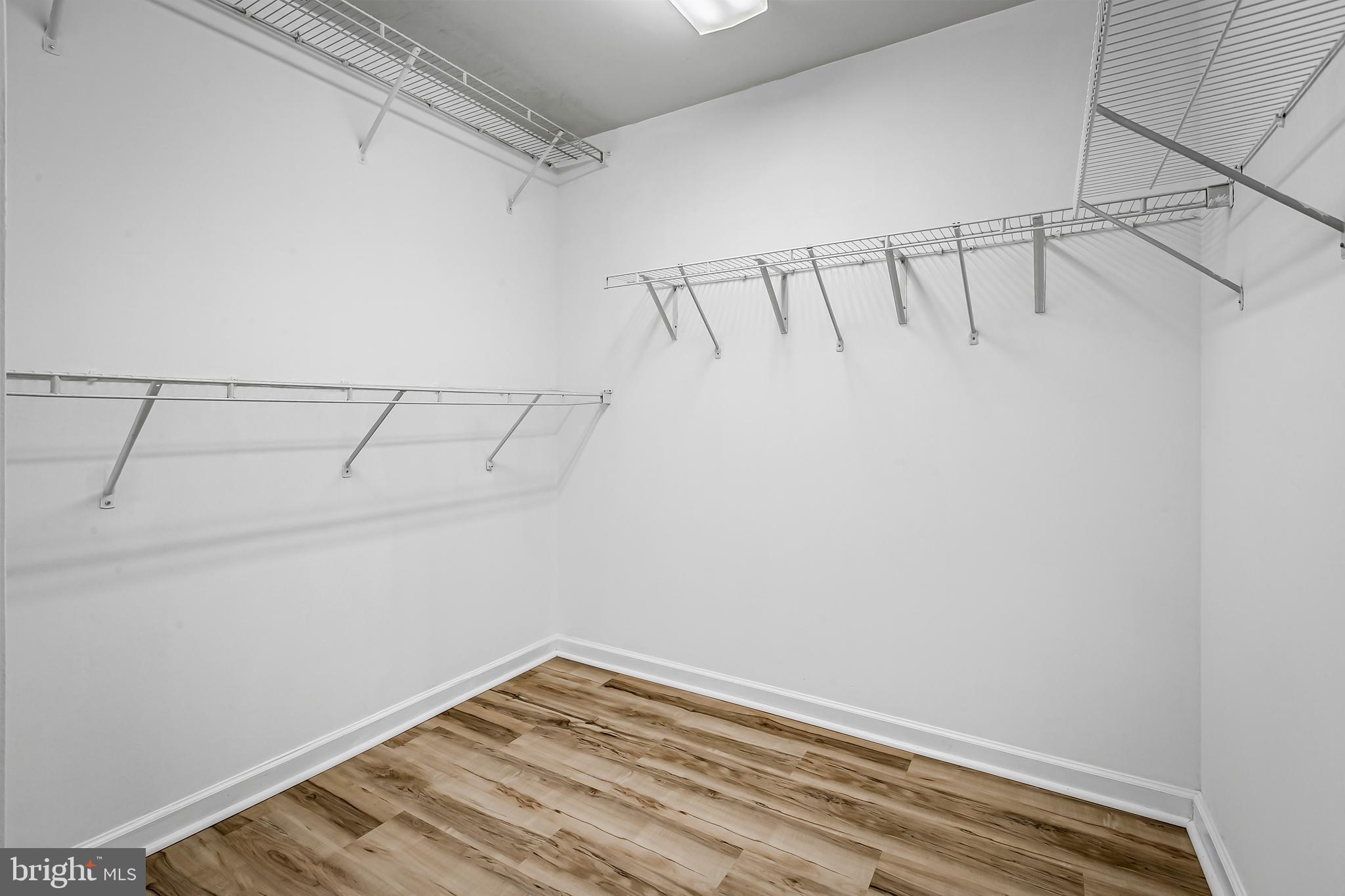960 Fell Street, Unit 311 Baltimore, MD 21231 - Photo 24 of 59 a view of a room with racks on the wall