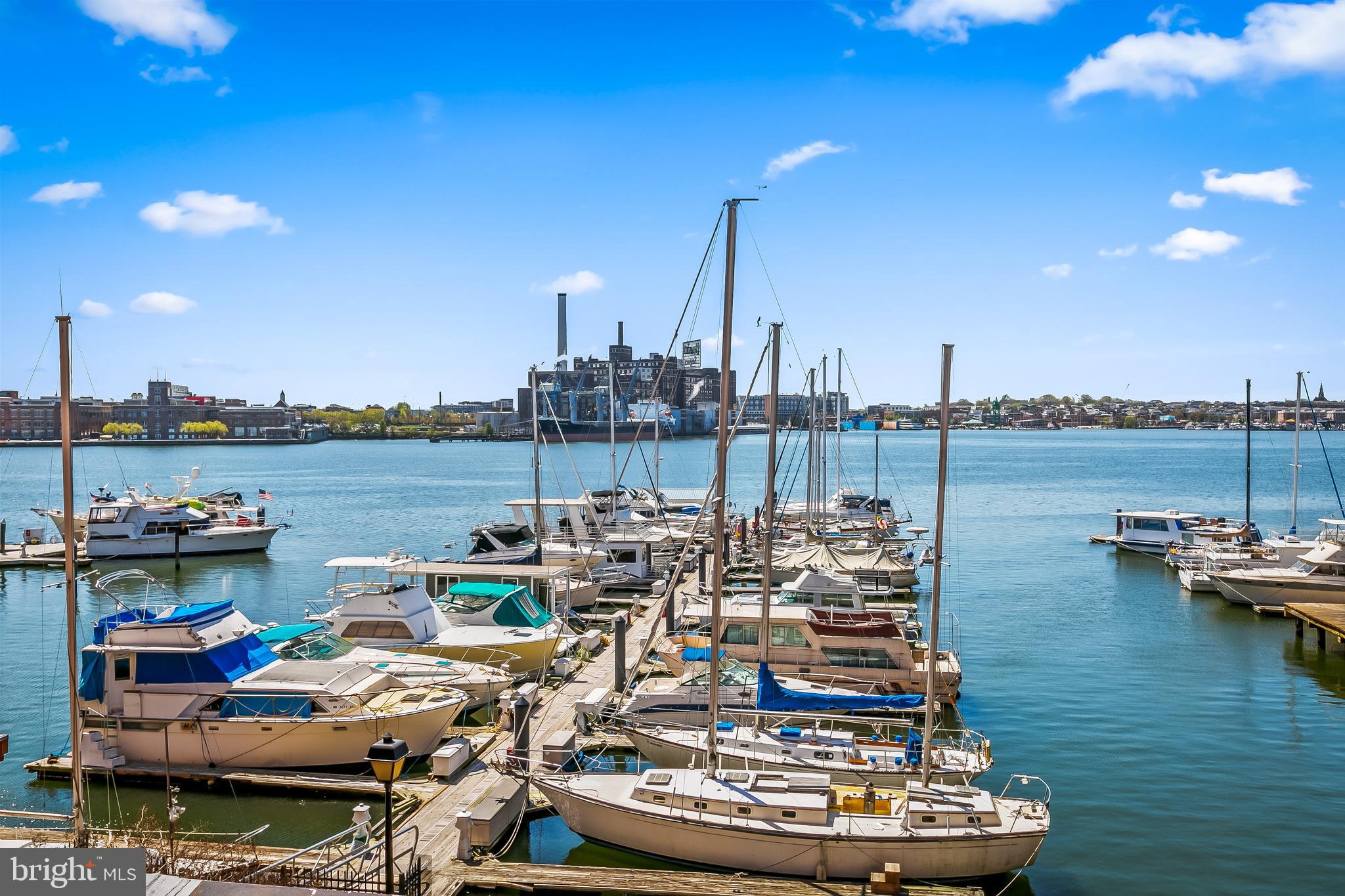 960 Fell Street, Unit 311 Baltimore, MD 21231 - Photo 36 of 59 a view of a lake with boats and trees