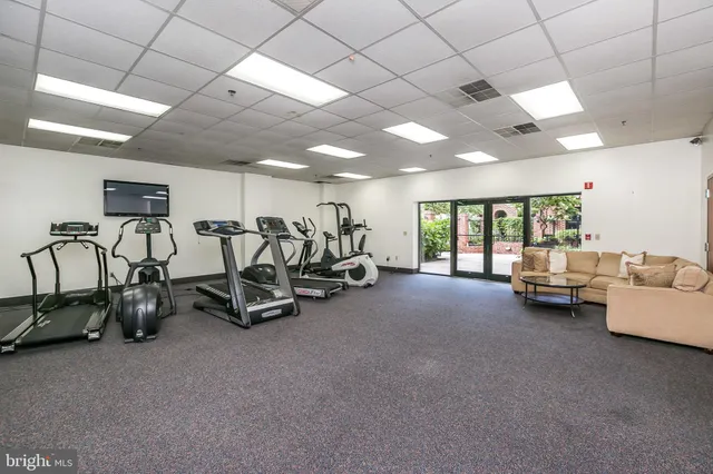 a view of a street with sitting area