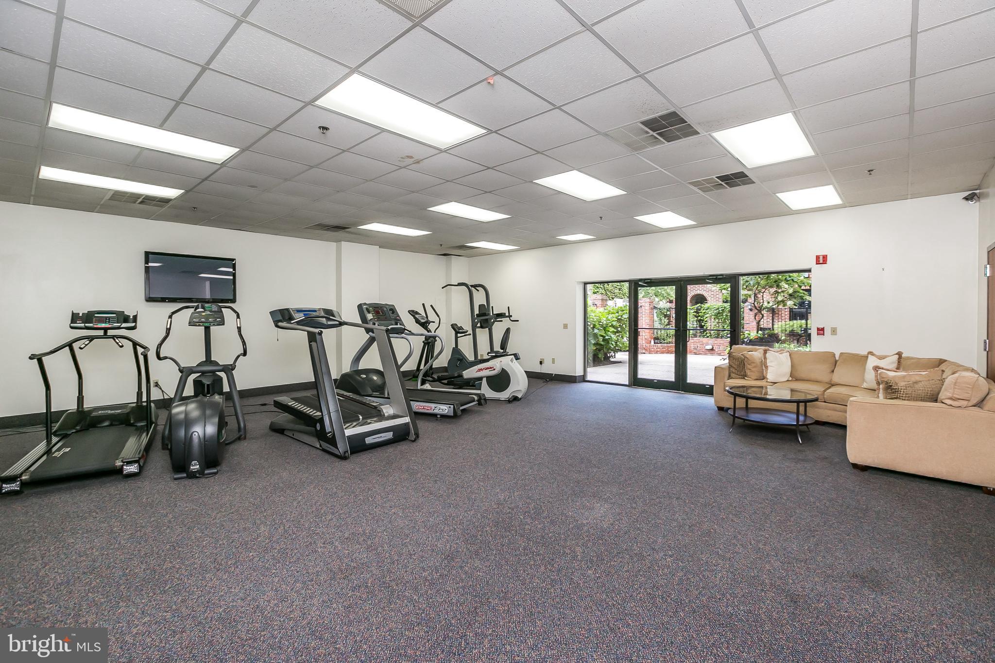 960 Fell Street, Unit 311 Baltimore, MD 21231 - Photo 42 of 59 a view of a room with gym equipment