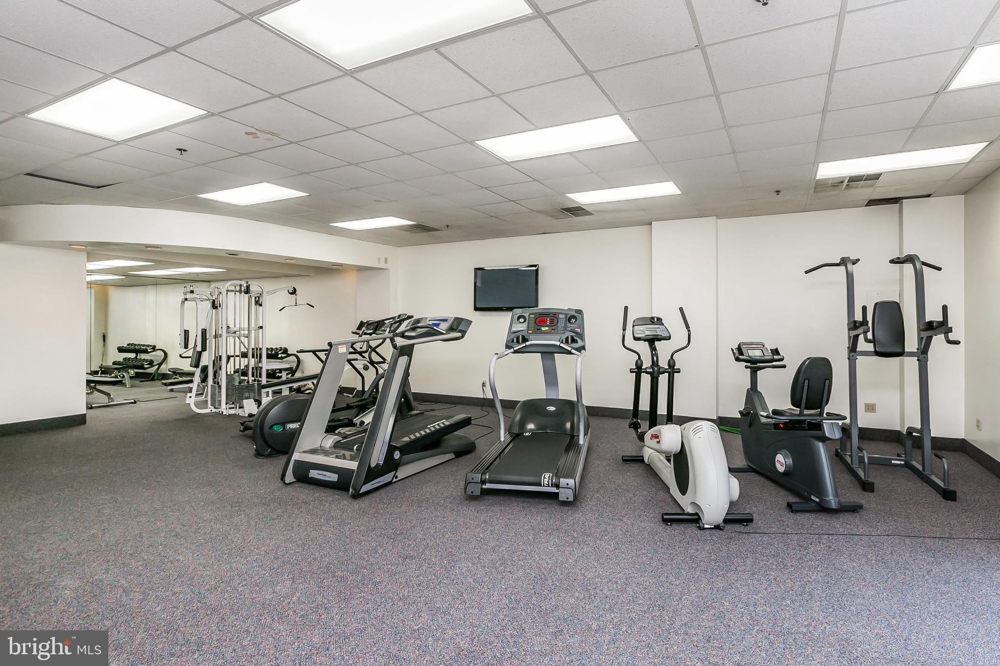 960 Fell Street, Unit 311 Baltimore, MD 21231 - Photo 43 of 59 a view of a room with gym equipment