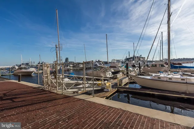 a view of a lake with tall buildings