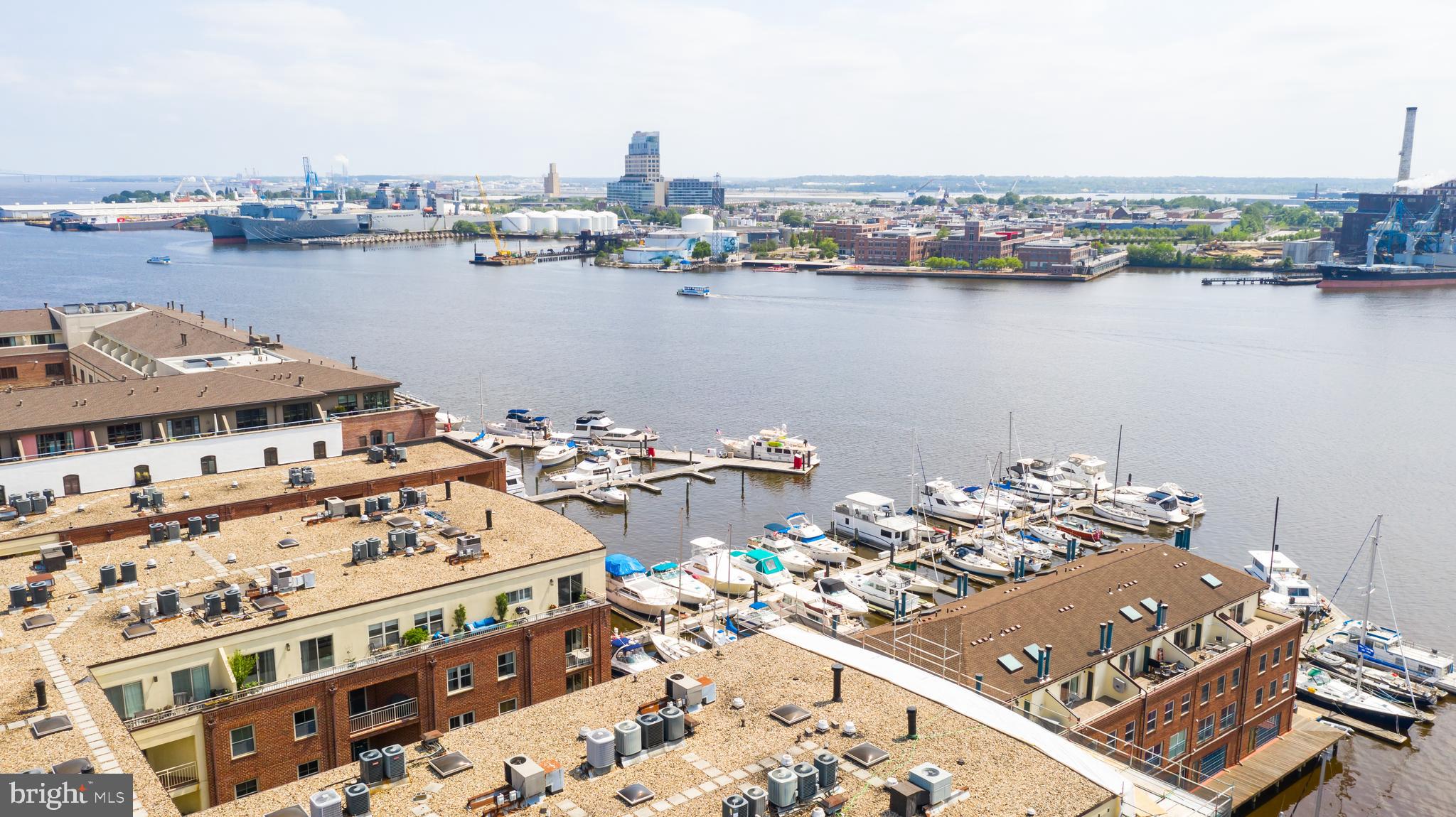 960 Fell Street, Unit 311 Baltimore, MD 21231 - Photo 57 of 59 a view of a lake with tall buildings