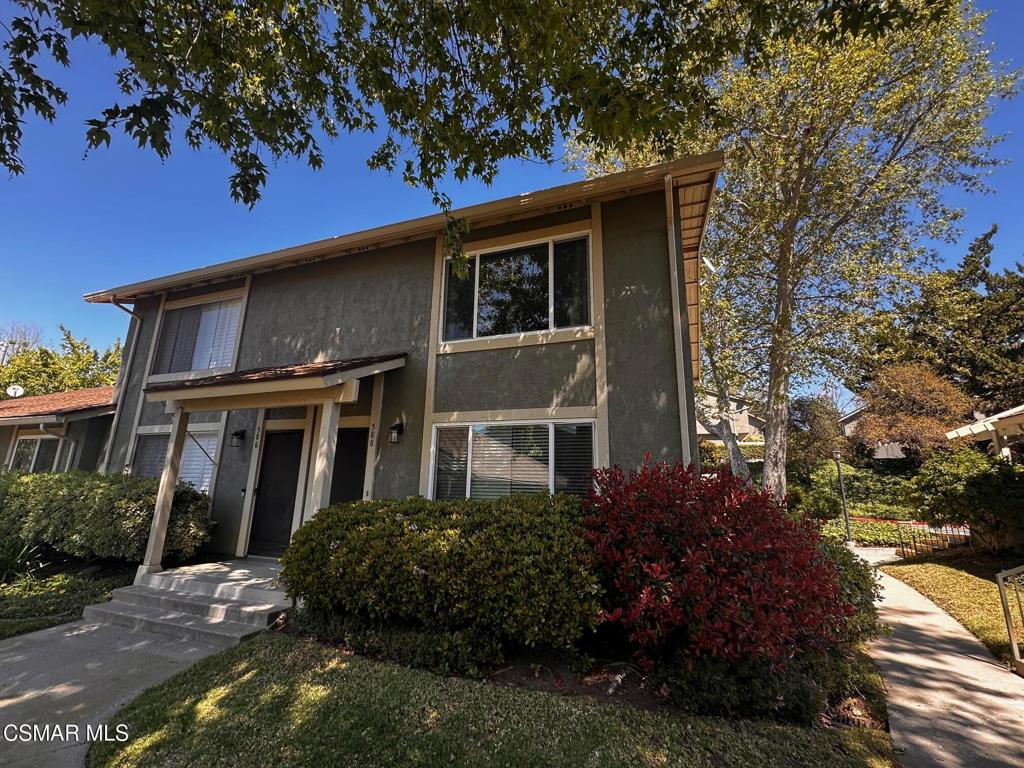 588 Rio Grande Circle Thousand Oaks, CA 91360 - Photo 1 of 30 a front view of a house with a garden
