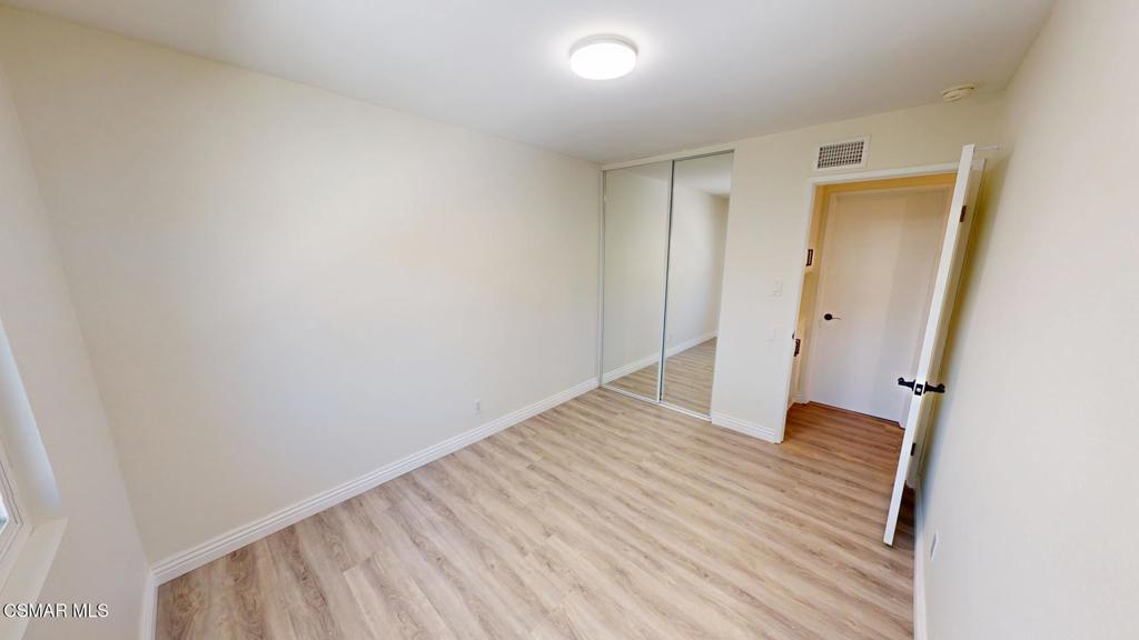 588 Rio Grande Circle Thousand Oaks, CA 91360 - Photo 20 of 30 an empty room with wooden floor and closet