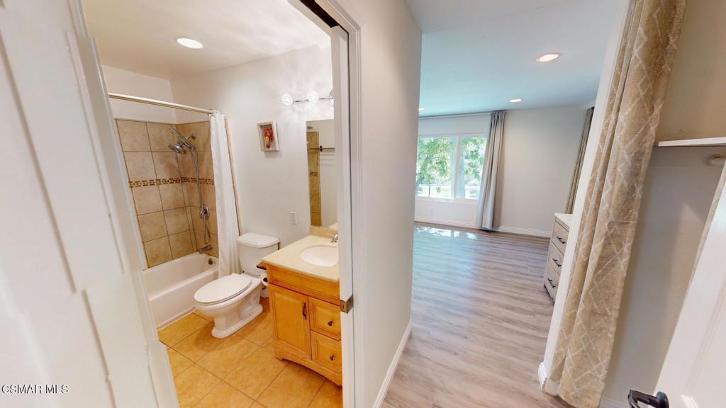 588 Rio Grande Circle Thousand Oaks, CA 91360 - Photo 21 of 30 a bathroom with a tub shower and sink