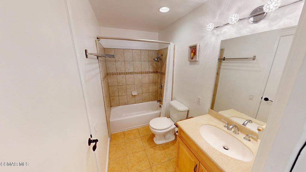 588 Rio Grande Circle Thousand Oaks, CA 91360 - Photo 22 of 30 a bathroom with a sink toilet and shower