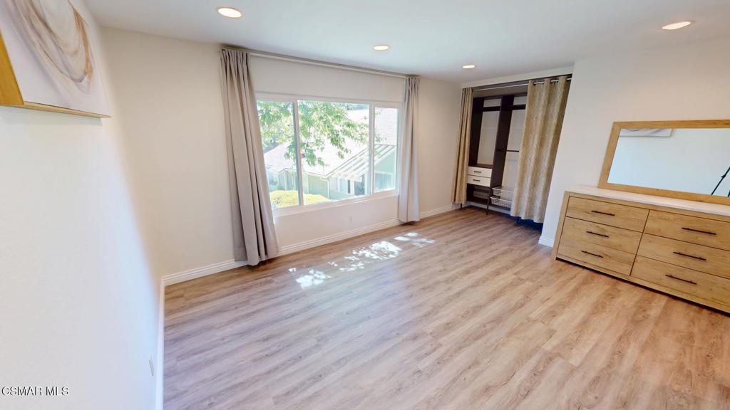 588 Rio Grande Circle Thousand Oaks, CA 91360 - Photo 24 of 30 wooden floor in an empty room with a window