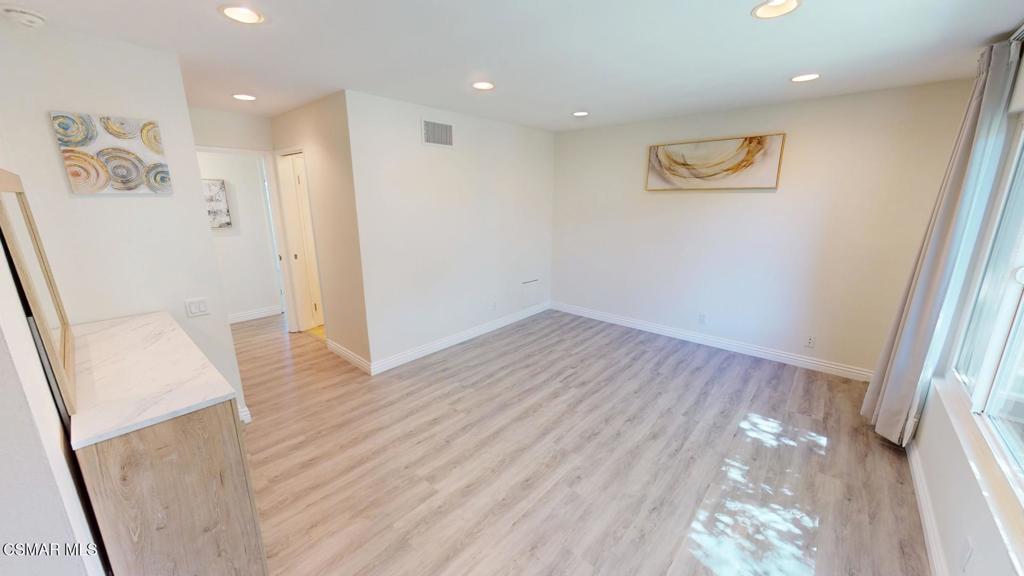 588 Rio Grande Circle Thousand Oaks, CA 91360 - Photo 26 of 30 a view of hallway with wooden floor