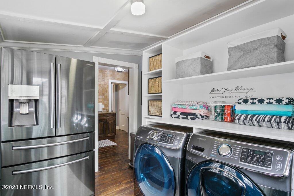 1623 Charon Road Jacksonville, FL 32205 - Photo 13 of 45 a utility room with stainless steel appliances washer and dryer