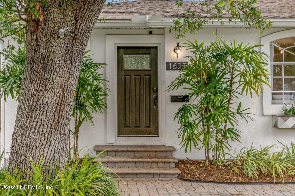 1623 Charon Road Jacksonville, FL 32205 - Photo 2 of 45 a front view of a house with a tree