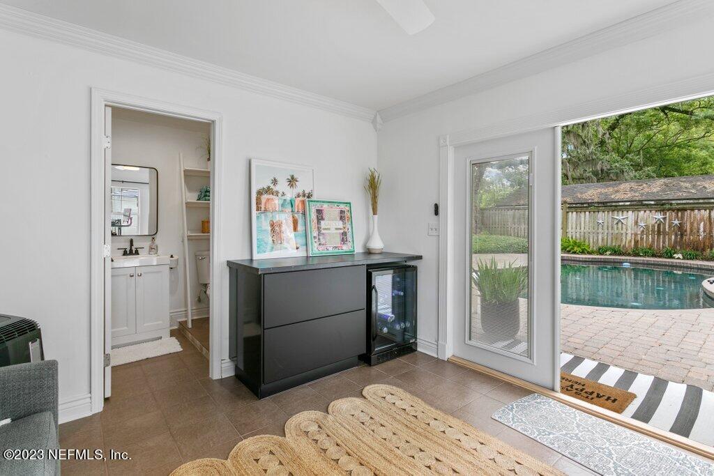 1623 Charon Road Jacksonville, FL 32205 - Photo 25 of 45 a view of bedroom with furniture and windows