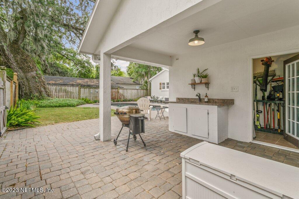 1623 Charon Road Jacksonville, FL 32205 - Photo 26 of 45 a work place with a chair and table