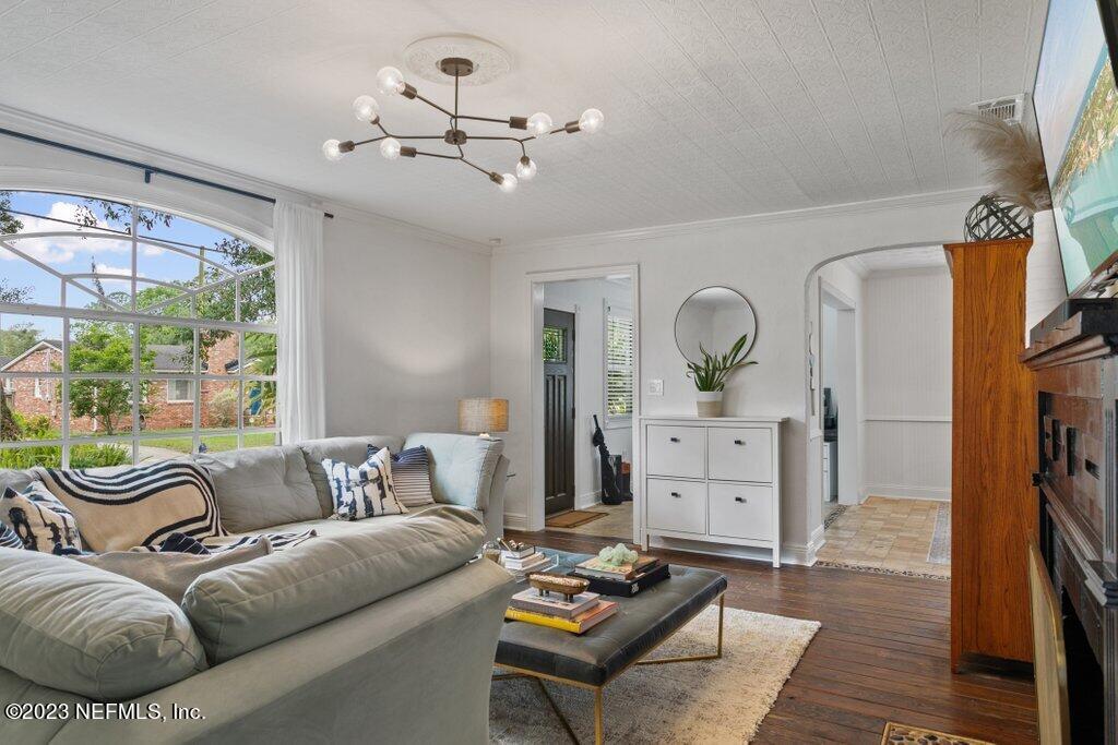 1623 Charon Road Jacksonville, FL 32205 - Photo 7 of 45 a living room with furniture and wooden floor