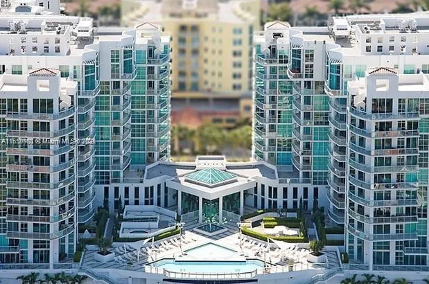 a view of a city with tall buildings