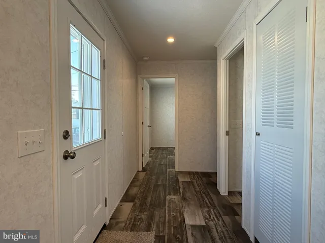 a view of a bathroom from the hallway