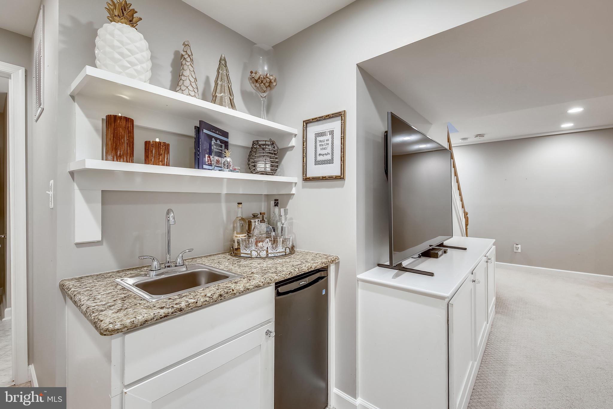 8011 Piney Branch Road Silver Spring, MD 20910 - Photo 26 of 35 Wet Bar with Additional Beverage Refrigerator