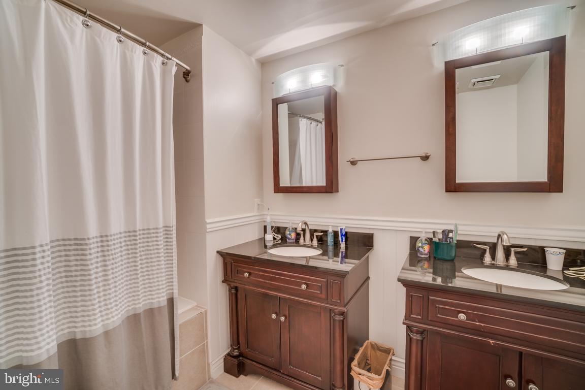 13100 Kidwell Field Road Herndon, VA 20171 - Photo 28 of 46 Updated vanities in the primary bathroom