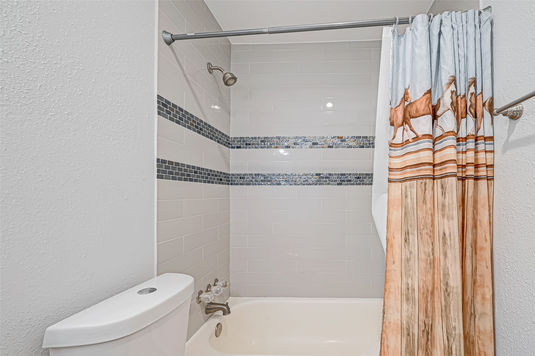 2201 Fountain View Drive, Unit 2 Houston, TX 77057 - Photo 23 of 28 a bathroom with a toilet and a shower