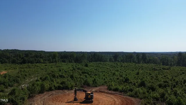 a view of a backyard with green space