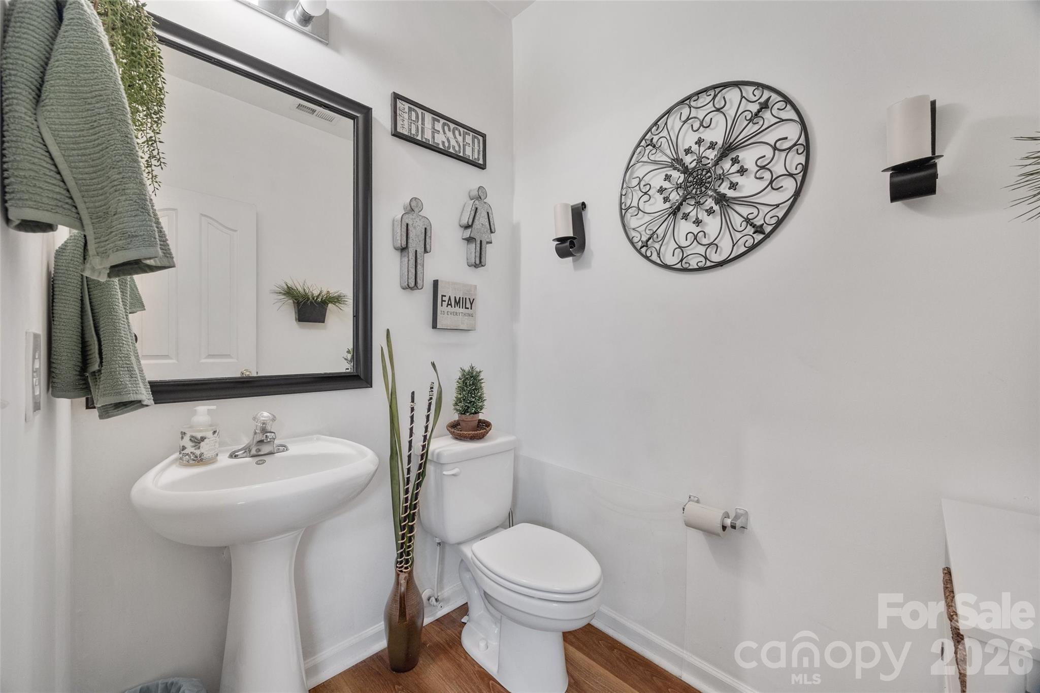 3419 Pickney Bluff Fort Mill, SC 29715 - Photo 15 of 36 a bathroom with a toilet sink and mirror