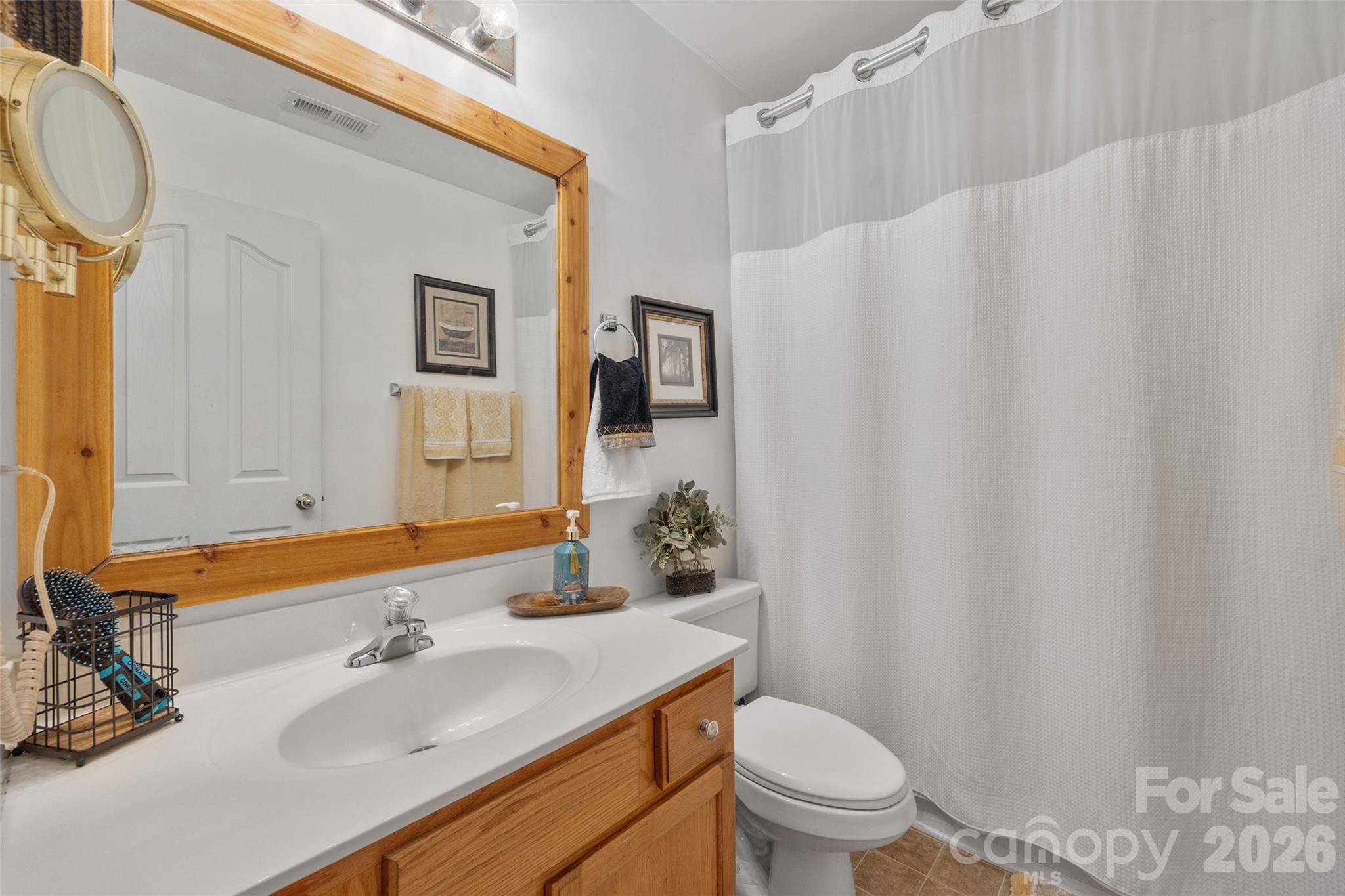 3419 Pickney Bluff Fort Mill, SC 29715 - Photo 25 of 36 a bathroom with a sink toilet and shower