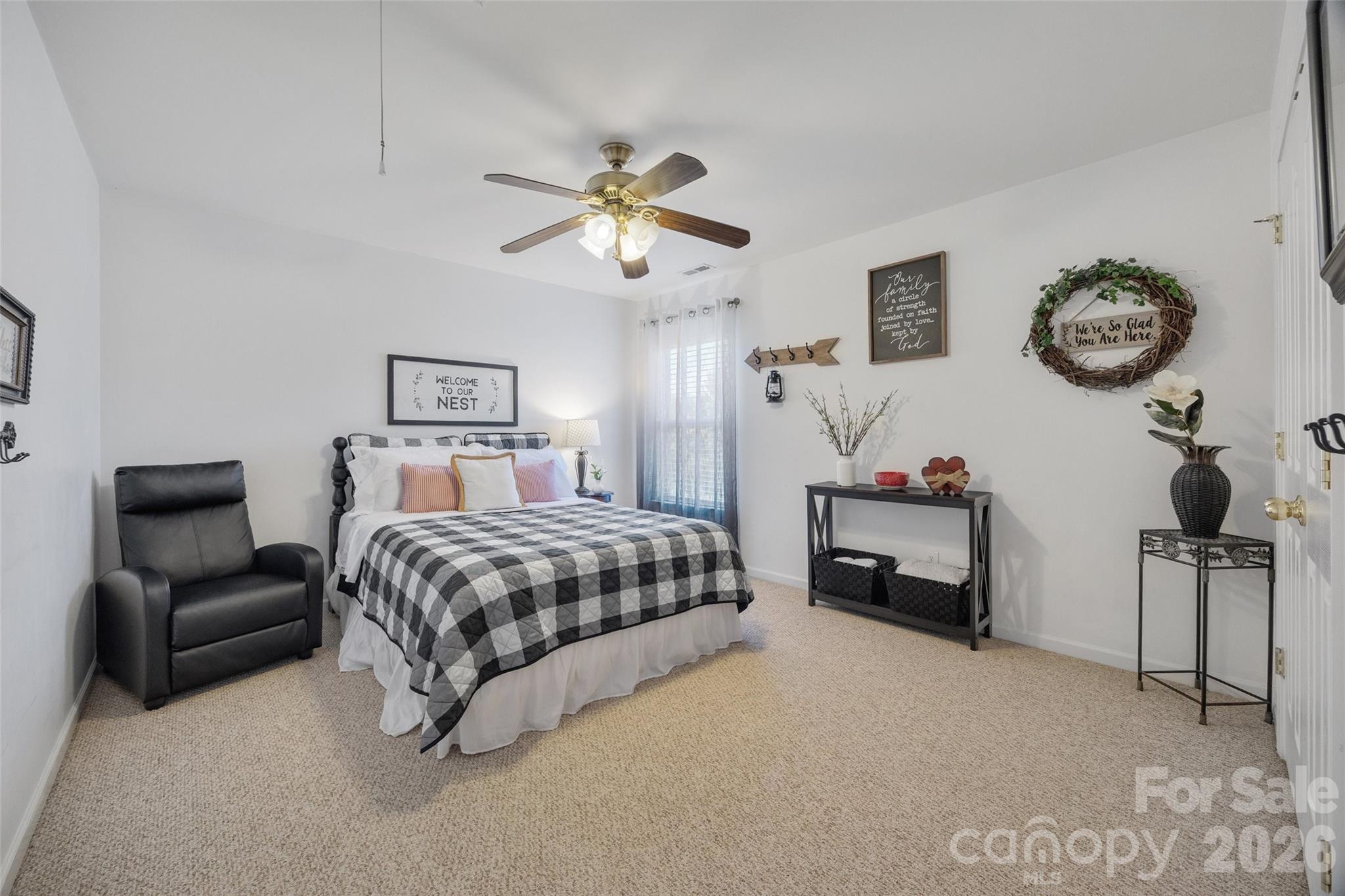 3419 Pickney Bluff Fort Mill, SC 29715 - Photo 26 of 36 a bedroom with furniture and a chandelier
