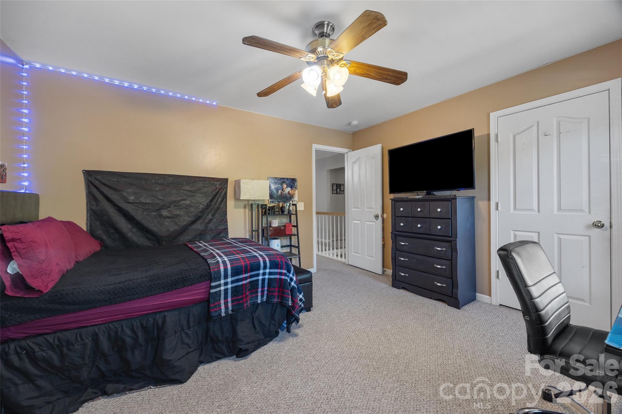 3419 Pickney Bluff Fort Mill, SC 29715 - Photo 29 of 36 a bedroom with furniture and a flat screen tv