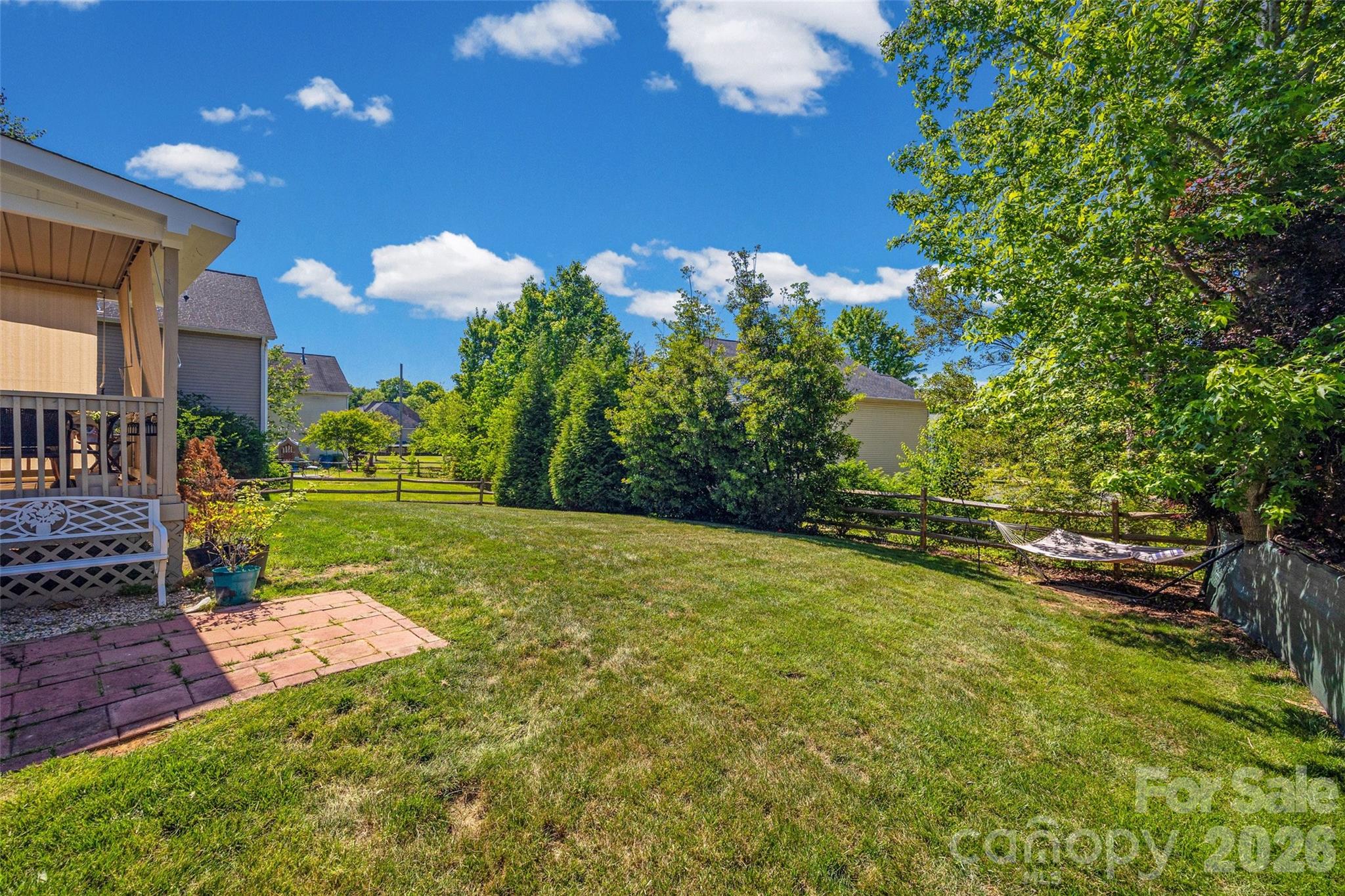 3419 Pickney Bluff Fort Mill, SC 29715 - Photo 32 of 36 a view of a yard with a tree