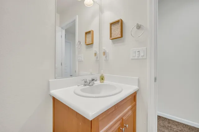 a view of a swimming pool with an outdoor seating