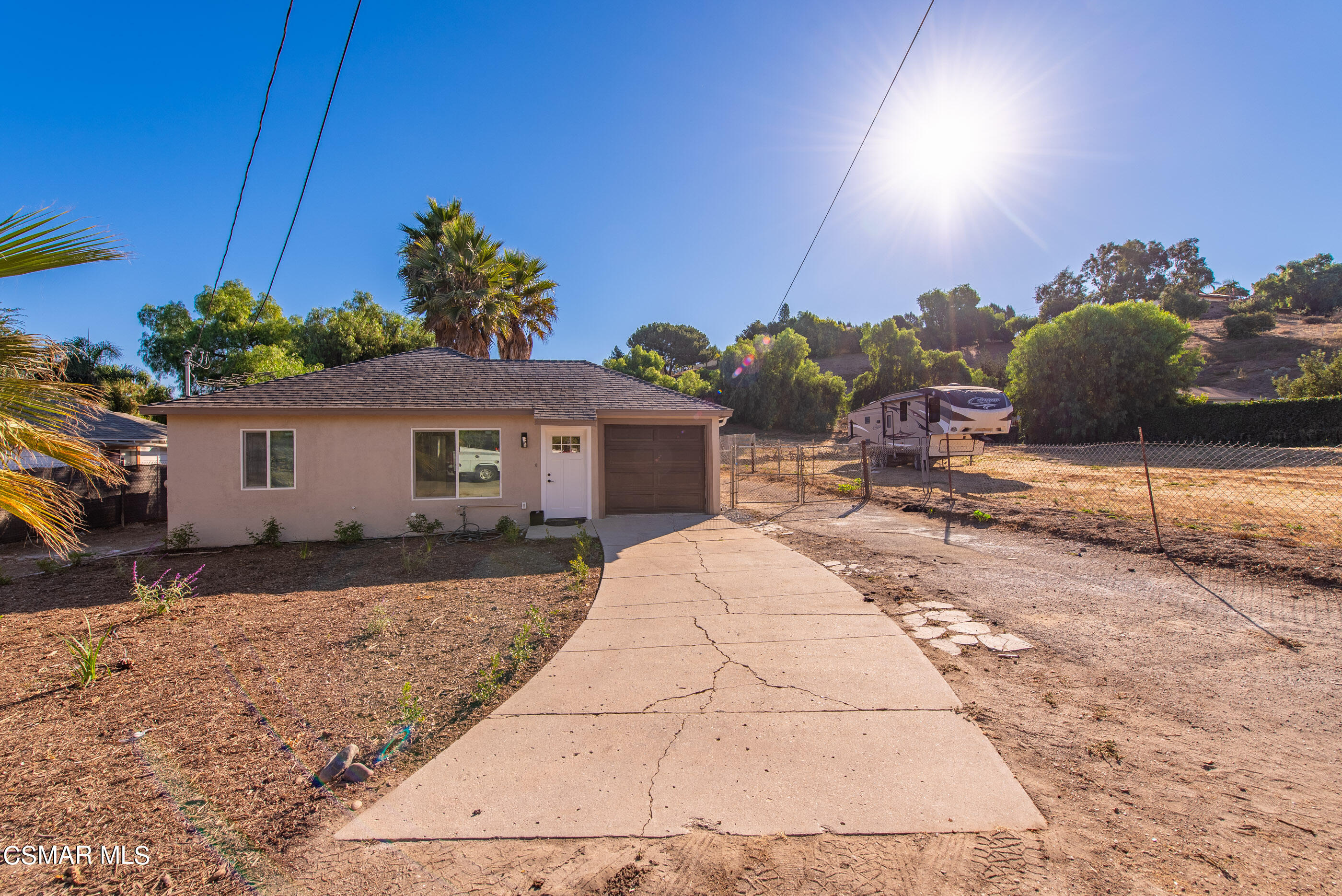 a front view of house with a yard