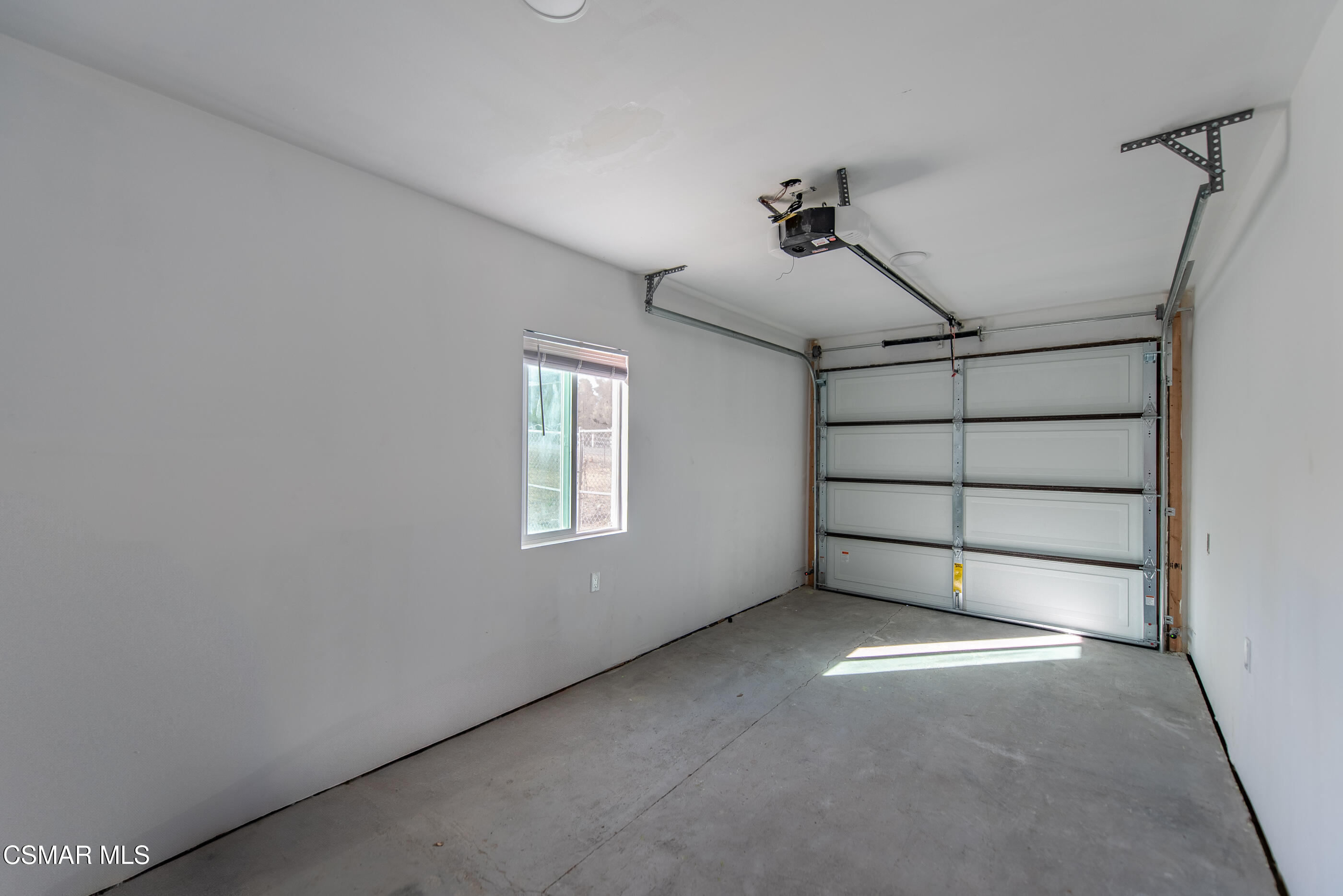 3942 Hitch Boulevard Moorpark, CA 93021 - Photo 14 of 42 a view of a livingroom with a ceiling fan and window