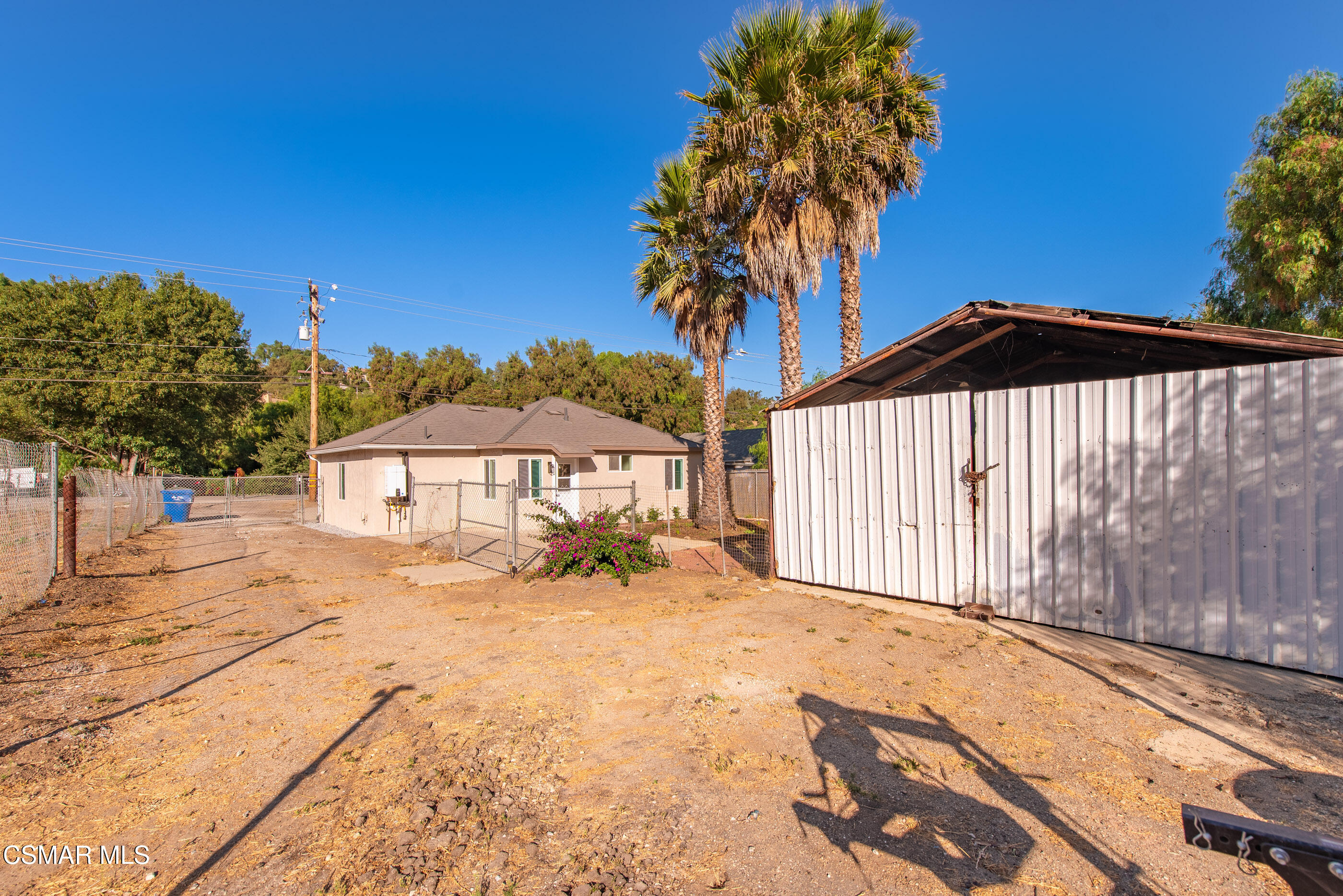 3942 Hitch Boulevard Moorpark, CA 93021 - Photo 16 of 42 a view of a house with a yard