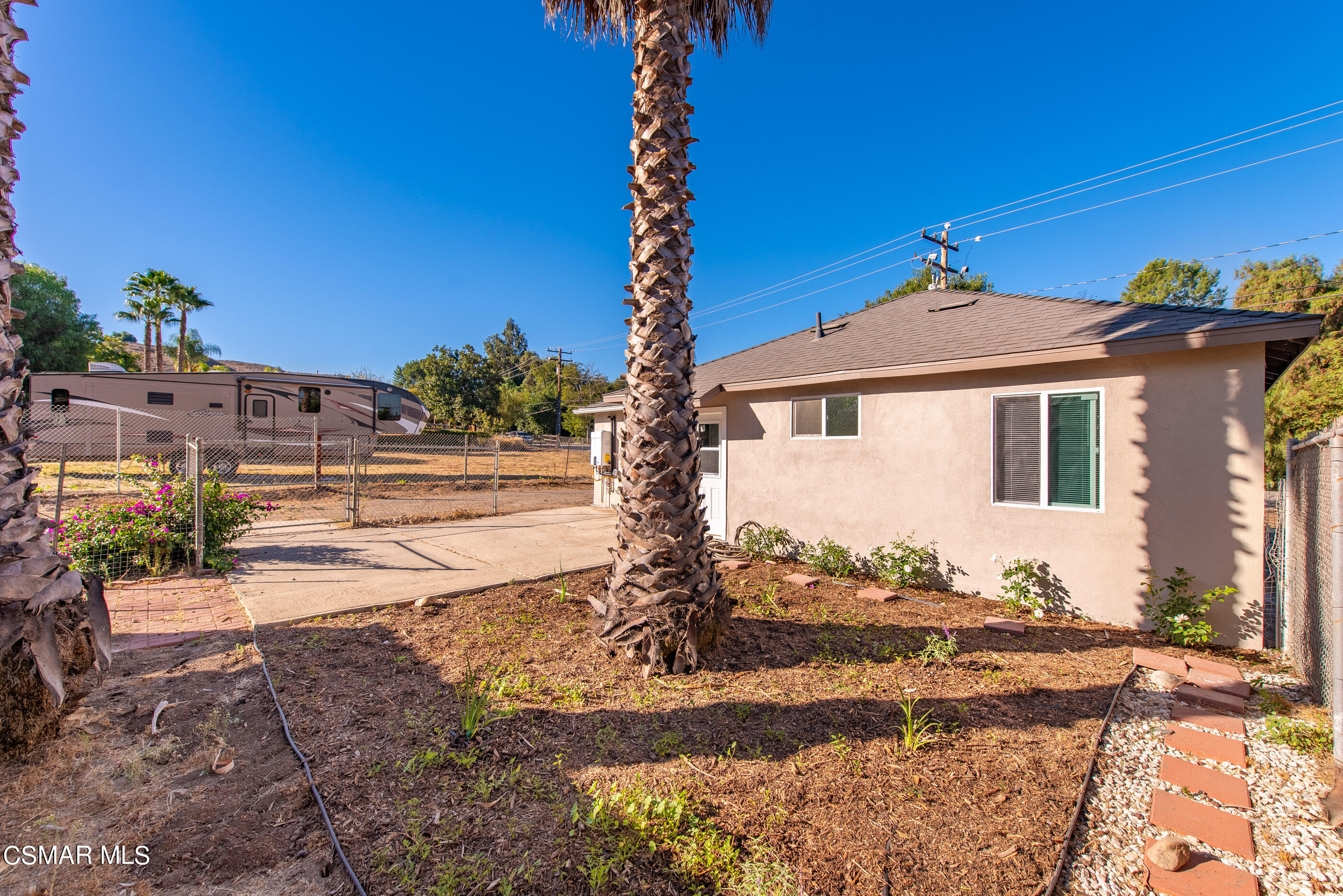 3942 Hitch Boulevard Moorpark, CA 93021 - Photo 18 of 42 a front view of a house with a yard