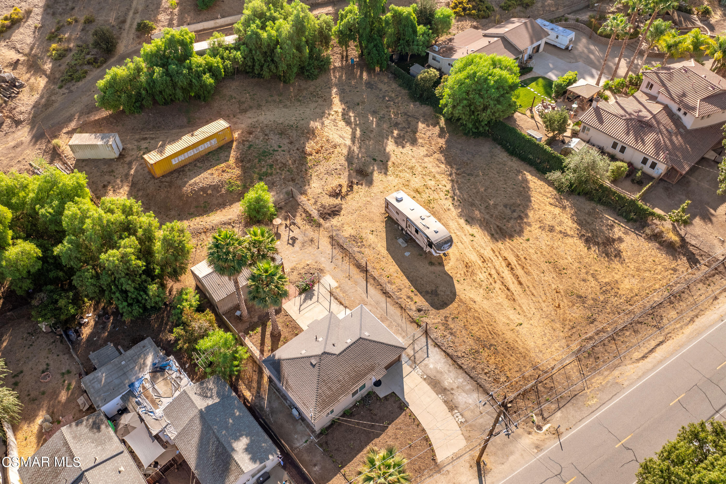 3942 Hitch Boulevard Moorpark, CA 93021 - Photo 2 of 42 a picture of flowers with wooden fence