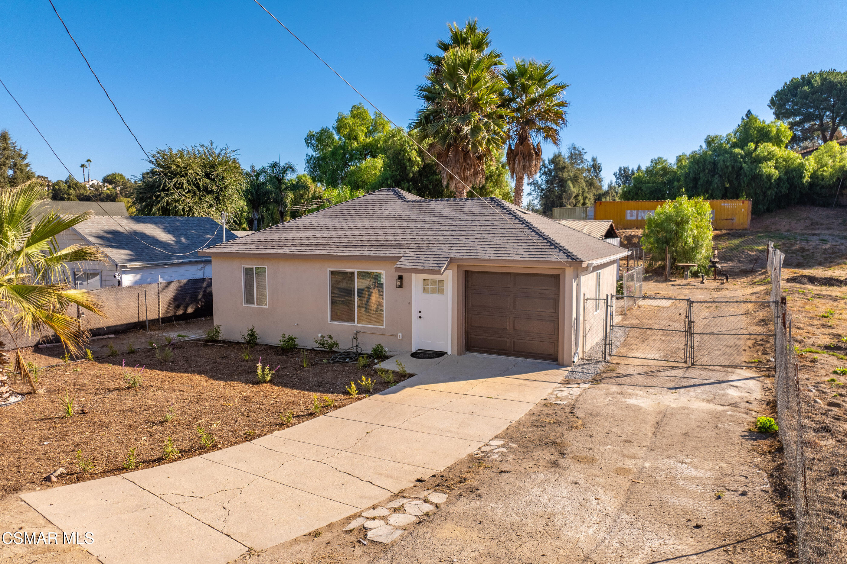 3942 Hitch Boulevard Moorpark, CA 93021 - Photo 41 of 42 a front view of a house with a yard