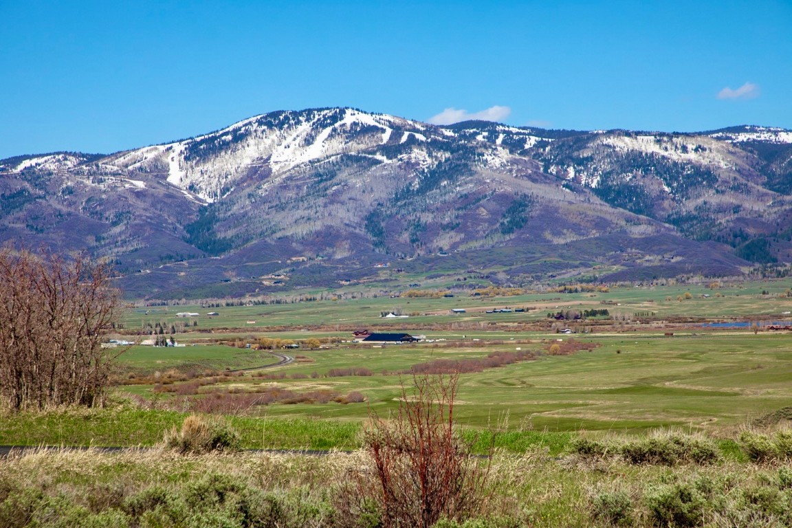 a view of an ocean and mountain view