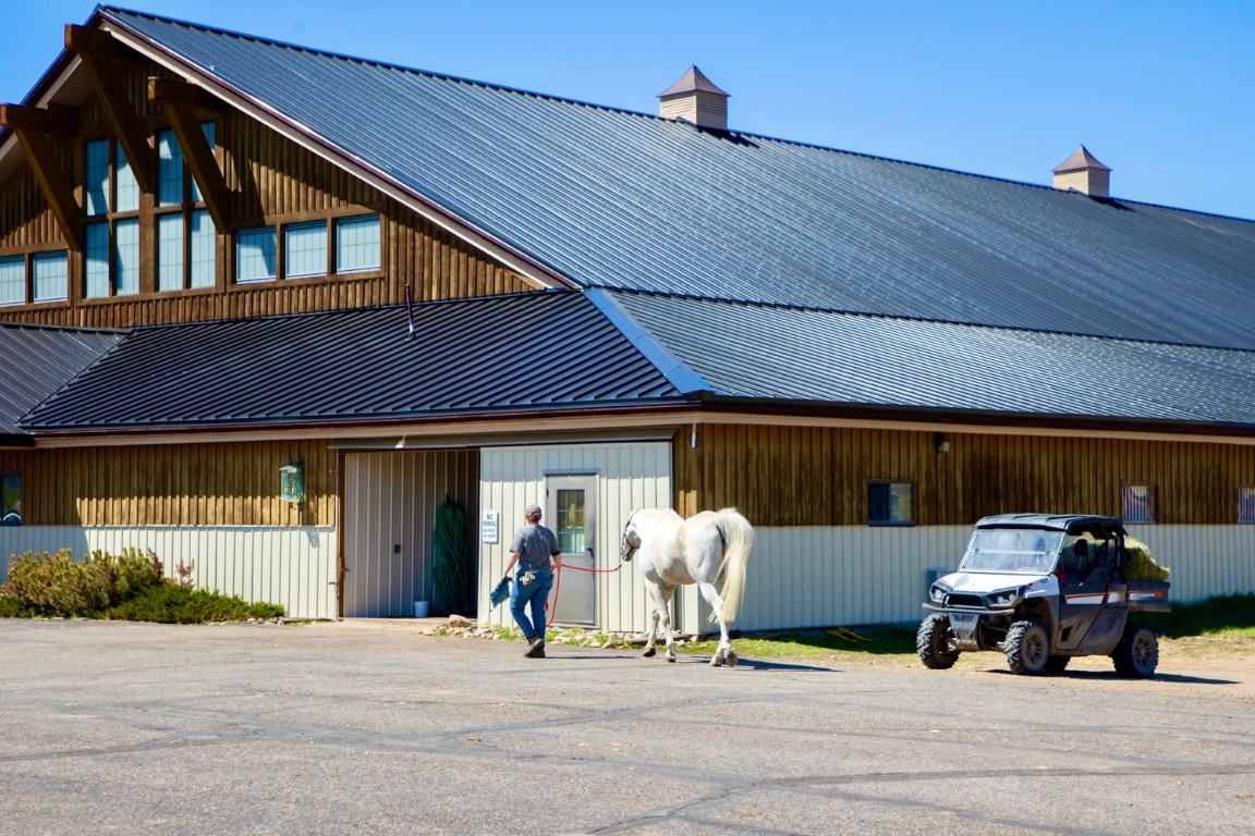 30665 Marshall Ridge Steamboat Springs, CO 80487 - Photo 20 of 25 a view of a patio with table and chairs and potted plants